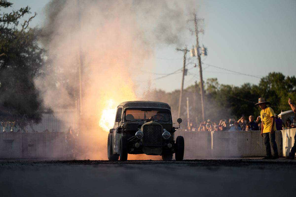 A modified vehicle shoots out fire during Burn ‘Em Up In The Pass on Thursday, Oct. 9, 2025.