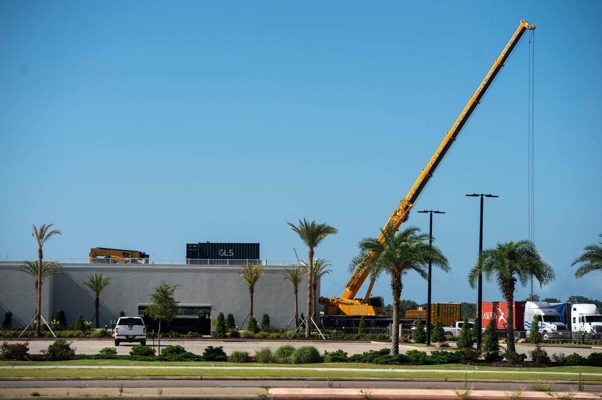 Assembly of the rides at Paradise Pier Fun Park at Margaritaville Resort in Biloxi begins on Wednesday, June 1, 2022.