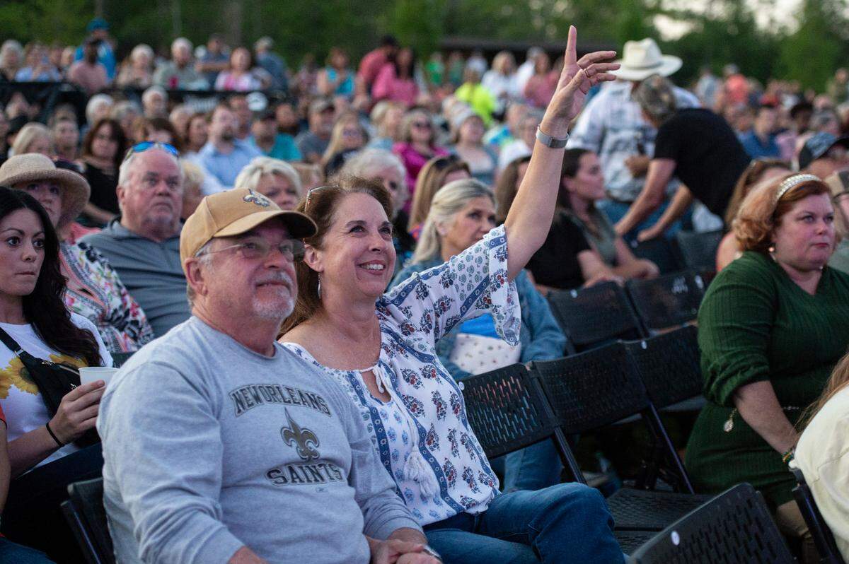 Fans dance during the KC and The Sunshine Band performance at the inaugural show at The Sound Amphitheater in Gautier on Friday, April 12, 2024.