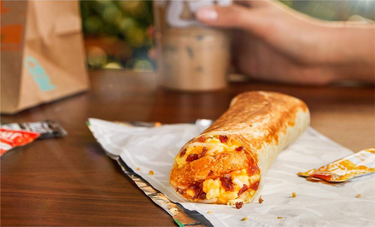 Customers can choose from Taco Bell’s Cheesy Toasted Breakfast Burrito, Hash Brown Toasted Breakfast Burrito or Grande Toasted Breakfast Burrito.