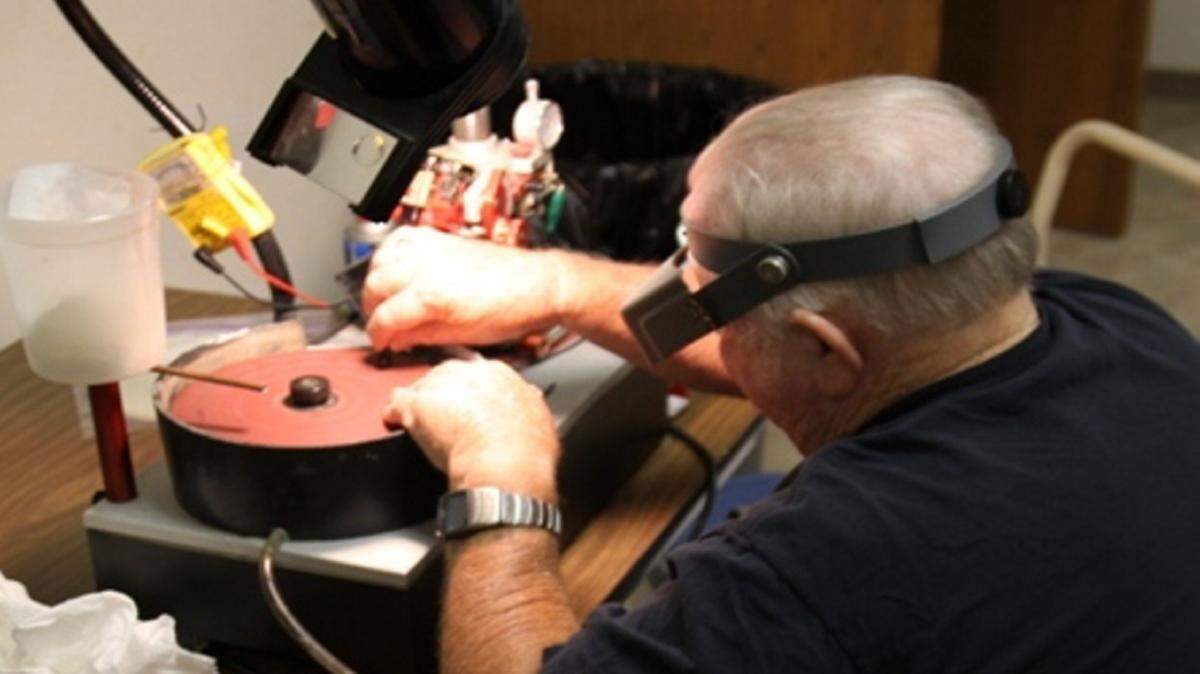 COURTESY MISSISSIPPI GULF COAST GEM AND MINERAL SOCIETYBuddy Shotts faceting a gemstone