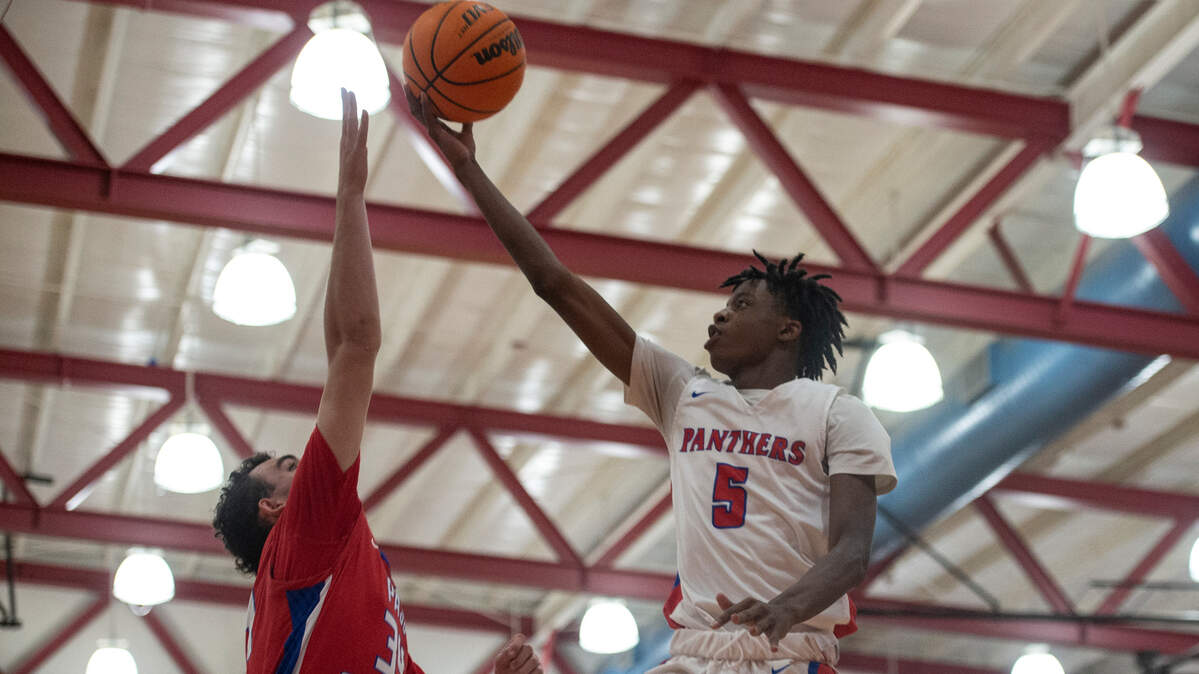 Pascagoula’s Kelan Rich goes for a layup during a game against Pass Christian at Pascagoula High School on Tuesday, Dec. 20, 2022.