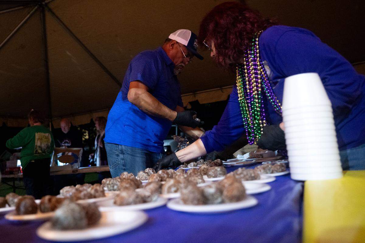 Complimentary desserts are prepared during a 12th Night Celebration in Biloxi on Monday, Jan. 5, 2026.