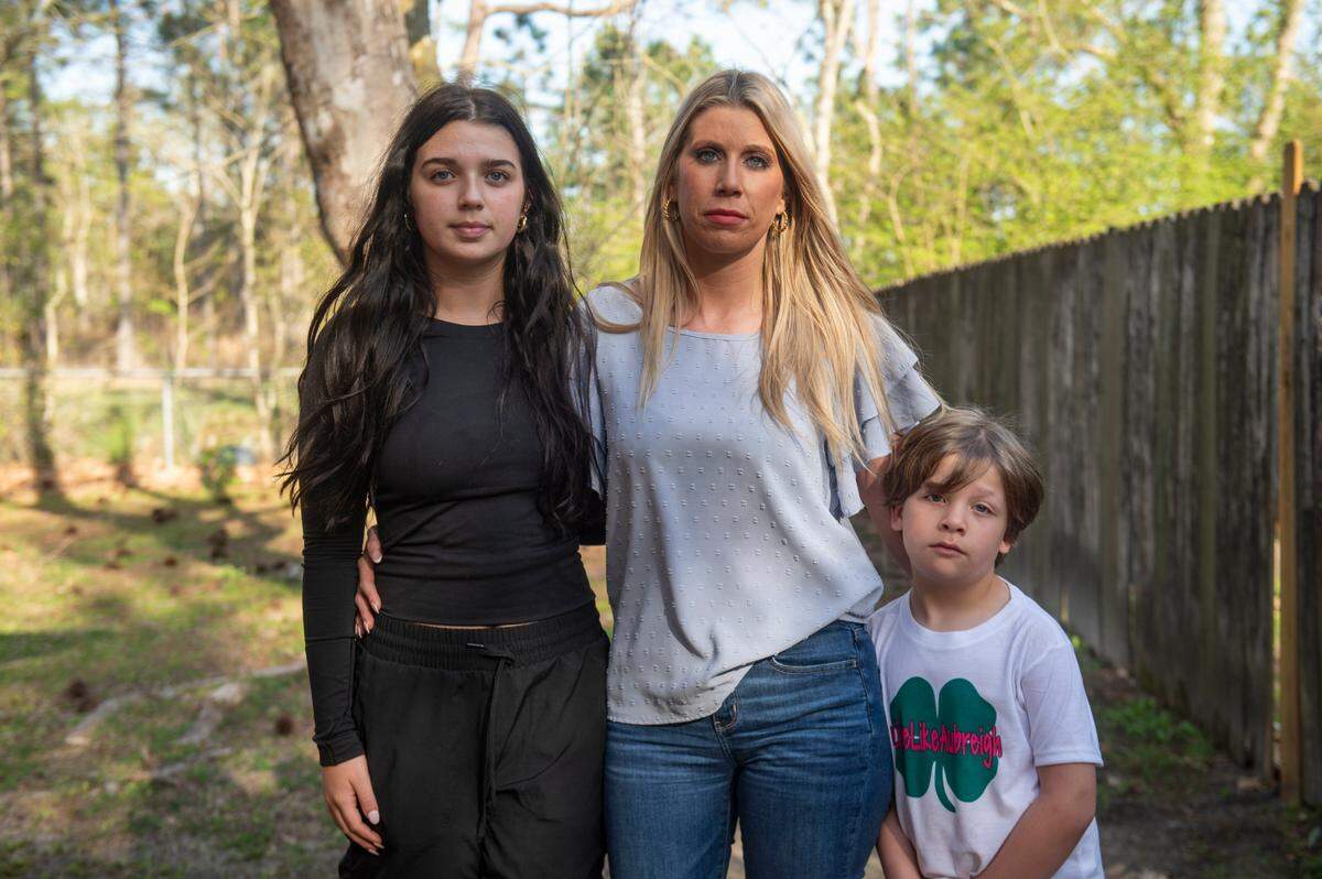 Heather Wyatt, center, and her children Taylor, 15, left, and Ryker, 6, at the Wyatt’s home in Ocean Springs on Tuesday, March 12, 2024. Heather and her children have been coping with the death of the middle child, 13-year-old Aubreigh, by suicide on Sept. 4, 2023.