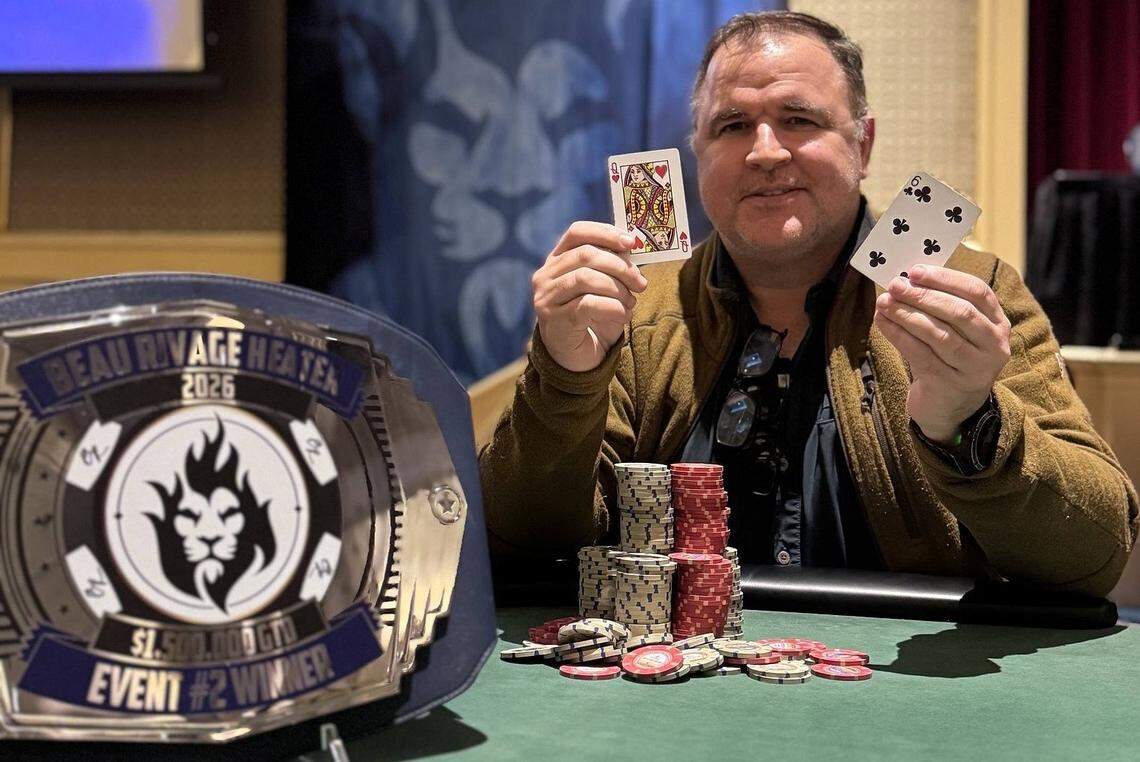 Jon Bergeron holds up his winning hand as he outplays thousands of others to win the belt and the poker jackpot at the Beau Rivage Heater. The hometown favorite is from Biloxi.