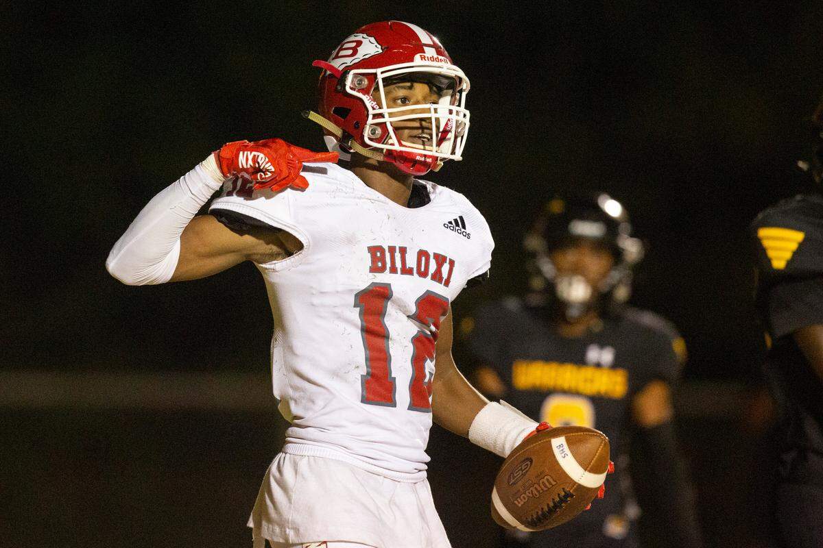 Biloxi’s Duran Parish makes a gesture at his throat after scoring a touchdown against D’Iberville during a game at Warriors Stadium in D’Iberville on Friday, Sept. 23, 2022. The gesture got him an unsportsmanlike conduct penalty.