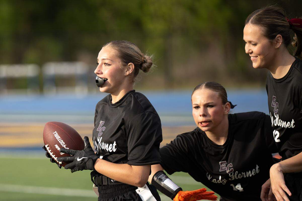 East Central’s Savannah Hoak (7) celebrates with her teammates during a flag football game at Joe Barlow Stadium on Wednesday, March 18, 2026.