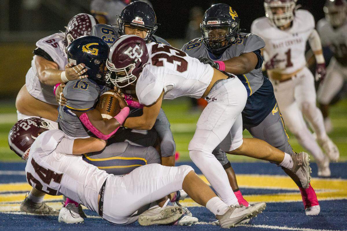 Gautier’s Solomon Baggett gets tackled by East Central during a game against East Central at Gautier High School in Gautier on Friday, Oct. 20, 2023.