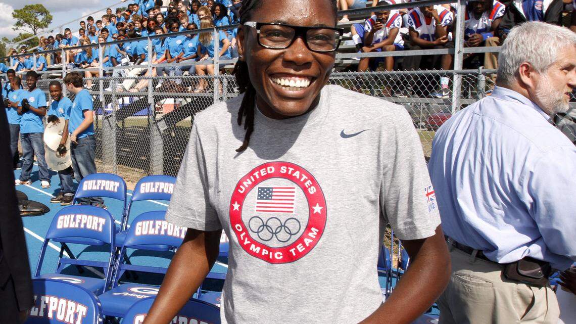 TIM ISBELL/SUN HERALD 
 Olympic Gold Medalist, Brittney Reese, receives a hero's welcome to the Gulfport track field after winning a gold medal in the London Olympics. Reese won the long jump Saturday at the U.S. Indoor Track and Field Championships in Portland, Ore.