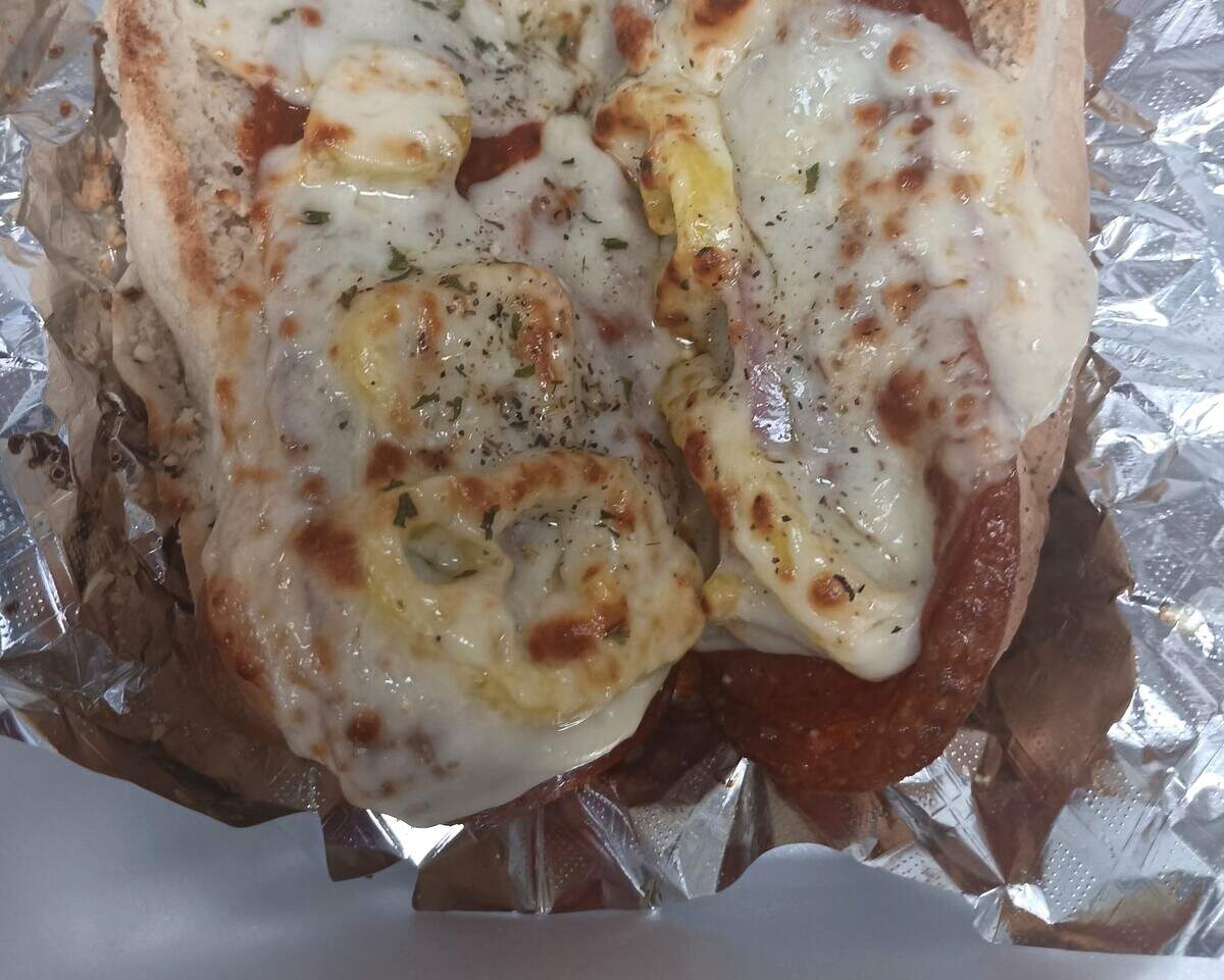 The pizza sub at Manetti’s Italian is filled with pepperoni, vegetables and broiled to melt the cheese.