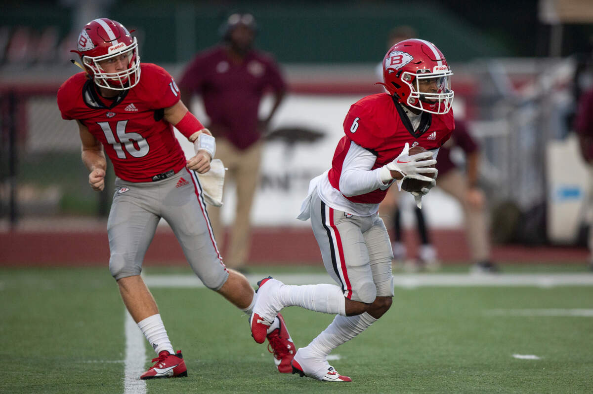 Biloxi quarterback Zachary Marlin hands the ball off to Biloxi’s Jalen Johnson during their game against George County at Biloxi High School on Friday, Sept. 8, 2023.