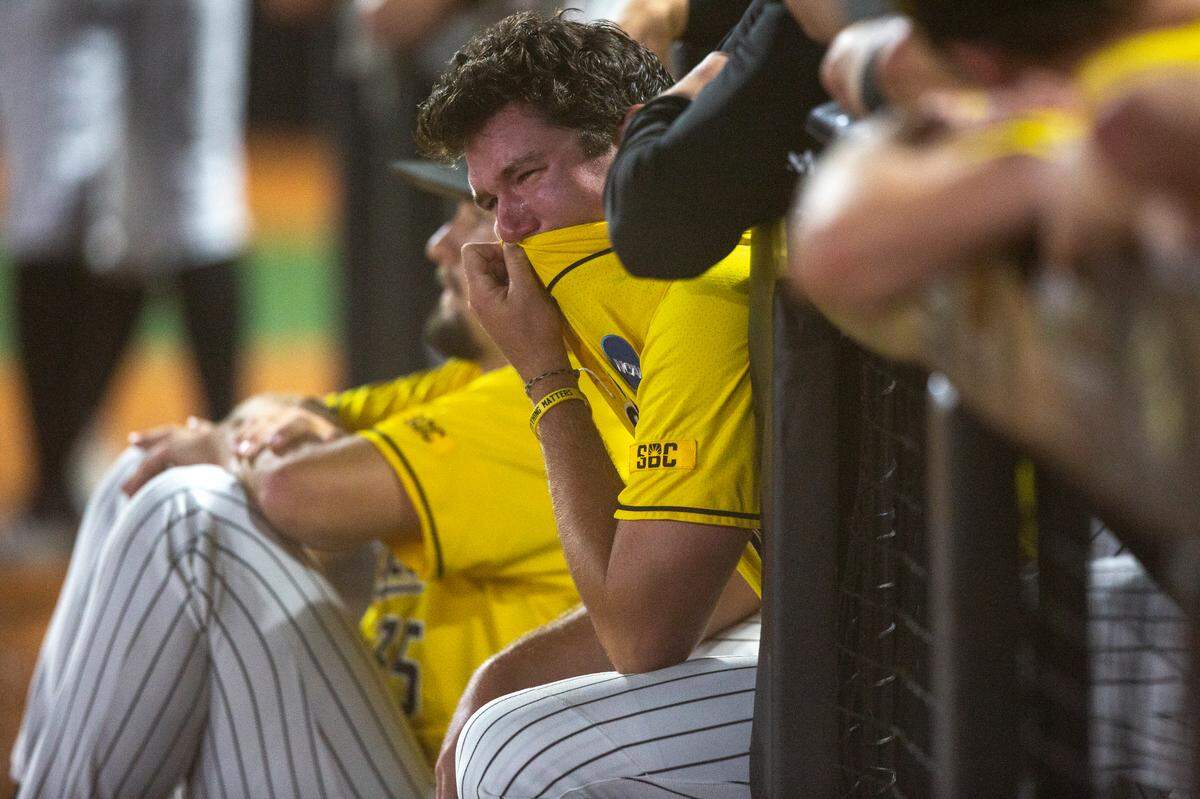 Southern Miss’ players react after Southern Miss lost to Tennessee in the NCAA Super Regional at Pete Taylor Park in Hattiesburg on Monday, June 12, 2023.