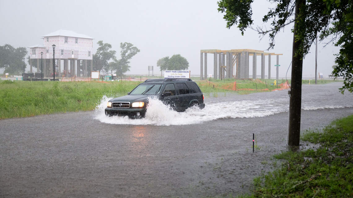 Remnants of Arthur pound South MS, with flood and flash-flood warnings announced