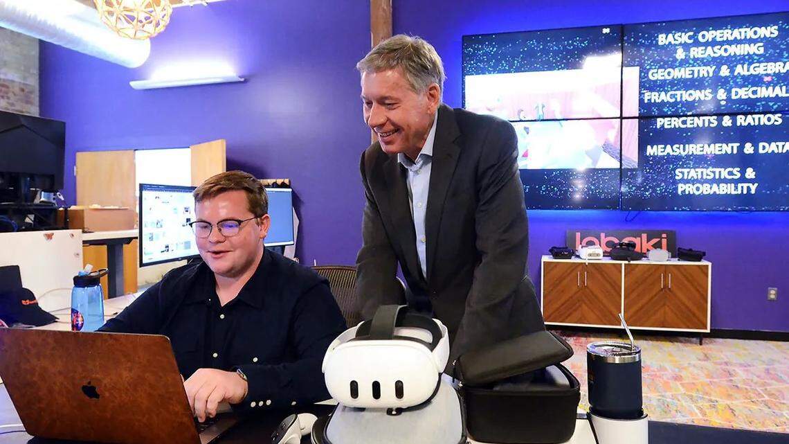 Lobaki Director of Production Zack Davenport (left) is seen with company President Kevin Loud at the VR company, earlier this month in Jackson.