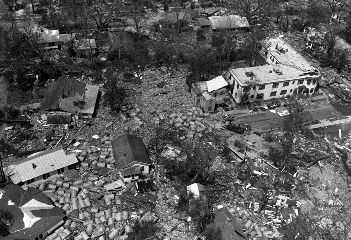 An aerial photograph taken of the 33rd Ave. area in Gulfport in August of 1969 after tons of paper rolls from the state port in Gulfport washed ashore during Hurricane Camille.