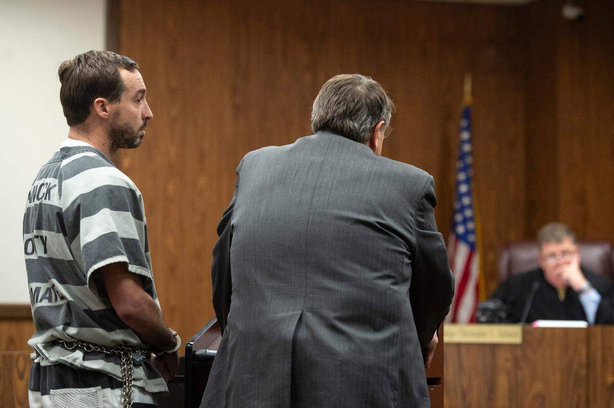 Alan Moran and his attorney Donald Rafferty stand before Judge Christopher Schmidt during Moran’s revocation hearing at Harrison County Circuit Court in Gulfport on Thursday, Dec. 19, 2024.
