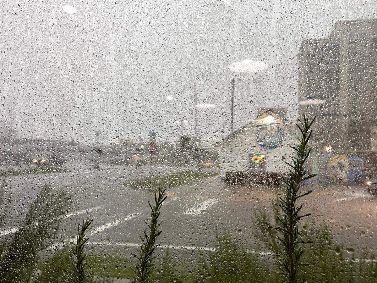 Thunderstorms dump rain on Highway 49 in downtown Gulfport on June 20, 2023.