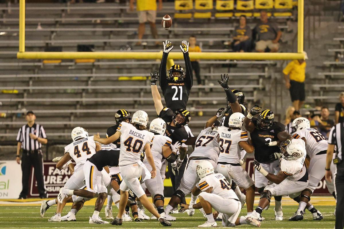 Southern Miss Golden Eagles defensive back Jay Stanley (21) attempts to block a field goal by UTEP during the game between Southern Miss and UTEP at Hancock M.M. Roberts Stadium, Hattiesburg, MS, October 9, 2021.