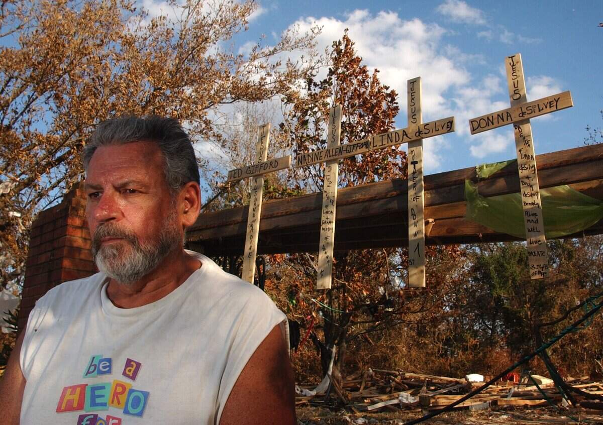 Doug deSilvey of Biloxi was the only survivor from a house on Point Porteaux in the Gulf Hills area of St. Martin. A wall of water swept away the house as Hurricane Katrina came ashore Monday, Aug. 29. On Wednesday, Sept. 7, 2005, deSilvey and other relatives visited the house, where they posted crosses in honor of deSilvey's ex-wife, Linda deSilvey, her parents Nadine Allen-Gifford and Ted Gifford, and his daughter, Donna deSilvey.