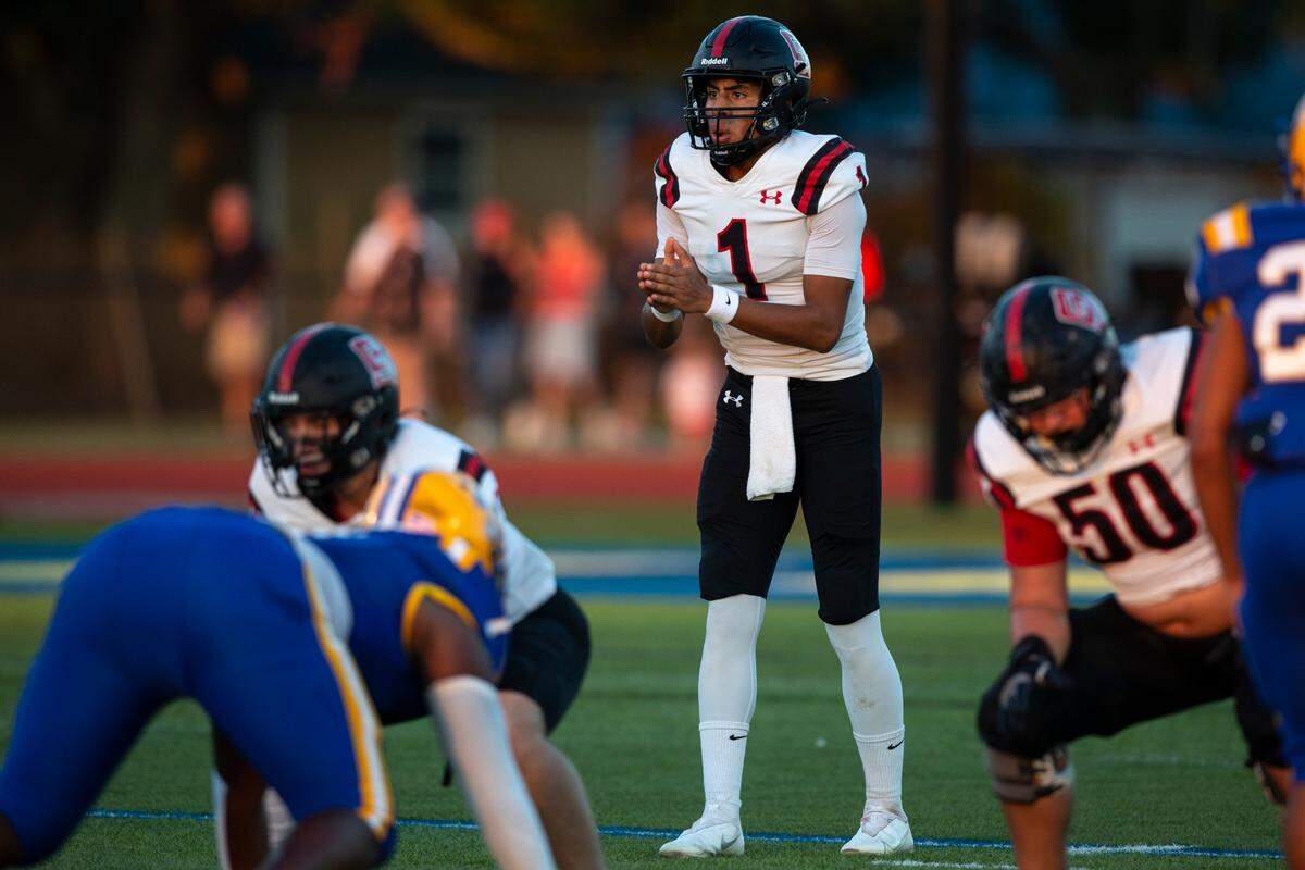 St. Stanislaus quarterback Ian Gael Gonzalez Rioz prepares for the snap during a game at Bay High in Bay St. Louis on Friday, Sept. 1, 2023.
