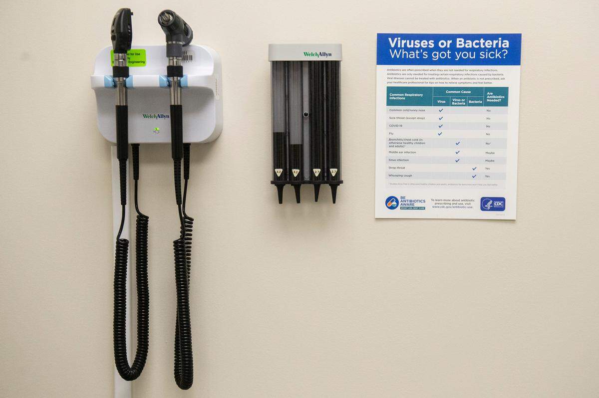 Signage in a patient room at a Memorial Health walk-in clinic in Gautier on Wednesday, Jan. 15, 2025, describes different illnesses. The Mississippi Coast has seen an increase in norovirus patients recently.