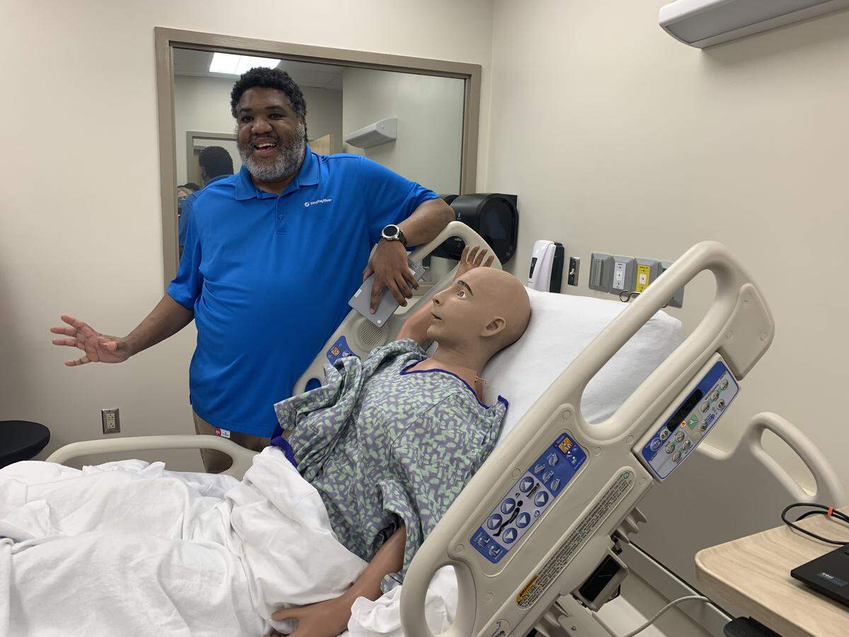 AI Alex is a mannequin at the new Singing River Healthcare Academy in Ocean Springs that “breathes,” talks and uses artificial intelligence to teach students with the latest technology. Instructor Richr’D Moore demonstrates how Alex works.