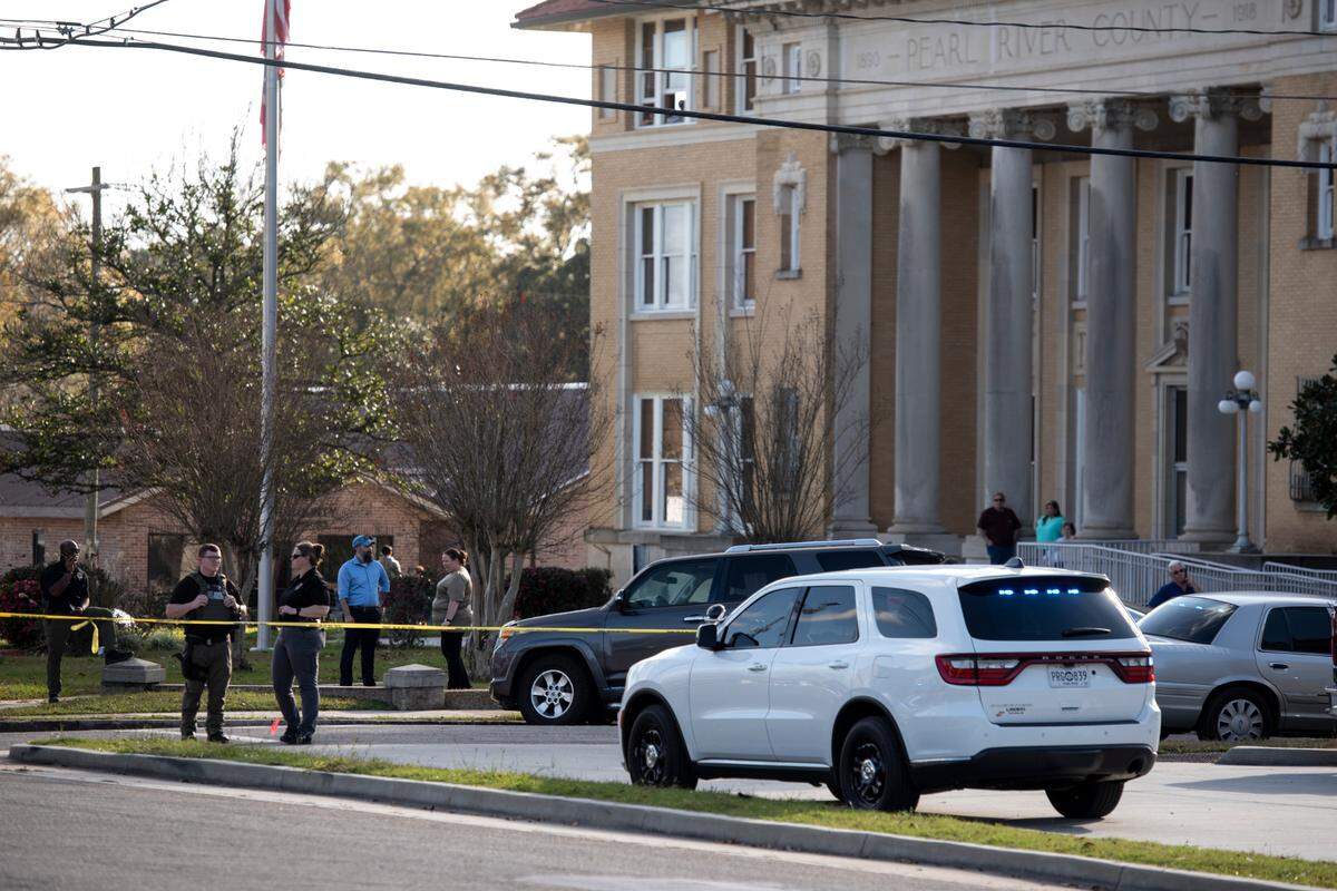 Law enforcement on the scene of a shooting outside the Pearl River County Courthouse Annex in Poplarville on Tuesday, Dec. 17, 2024.
