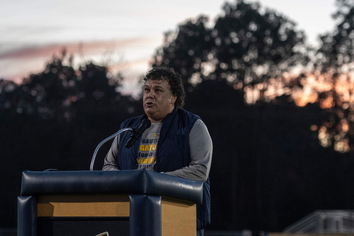 Casey Vaughan, mayor of Gautier, speaks during a candlelight vigil in honor and memory of three Gautier High School graduates at Gautier High School in Gautier on Thursday, Dec. 7, 2023. Se’Dhari Saniya Watson-Person, Kyla “Muffin” Watkins, and Tatyanna Richmond were involved in a fatal crash on Tuesday, leading to the deaths of Watson-Person and Watkins. Richmond remains hospitalized.