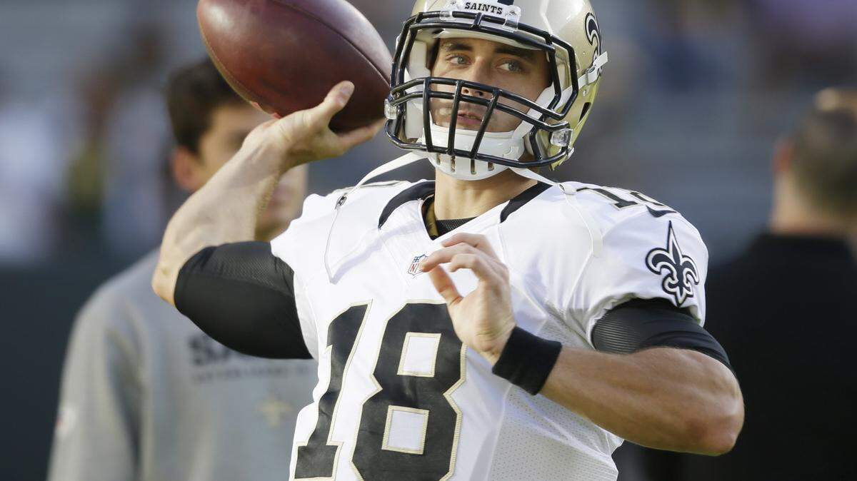New Orleans Saints quarterback Garrett Grayson warms up before a preseason NFL football game against the Green Bay Packers Thursday, Sept. 3, 2015, in Green Bay, Wis. (AP Photo/Jeffrey Phelps)