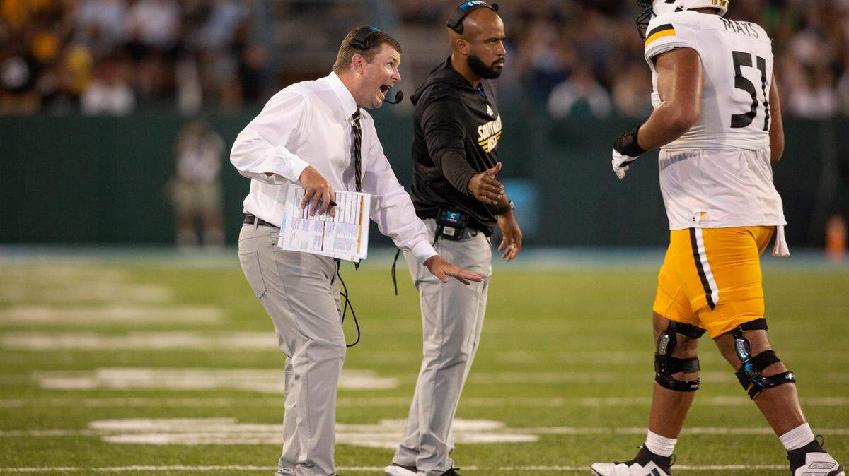 Southern Miss Coach Will Hall talks to his players during a game against Tulane at Yulman Stadium in New Orleans on Saturday, Sept. 24, 2022.