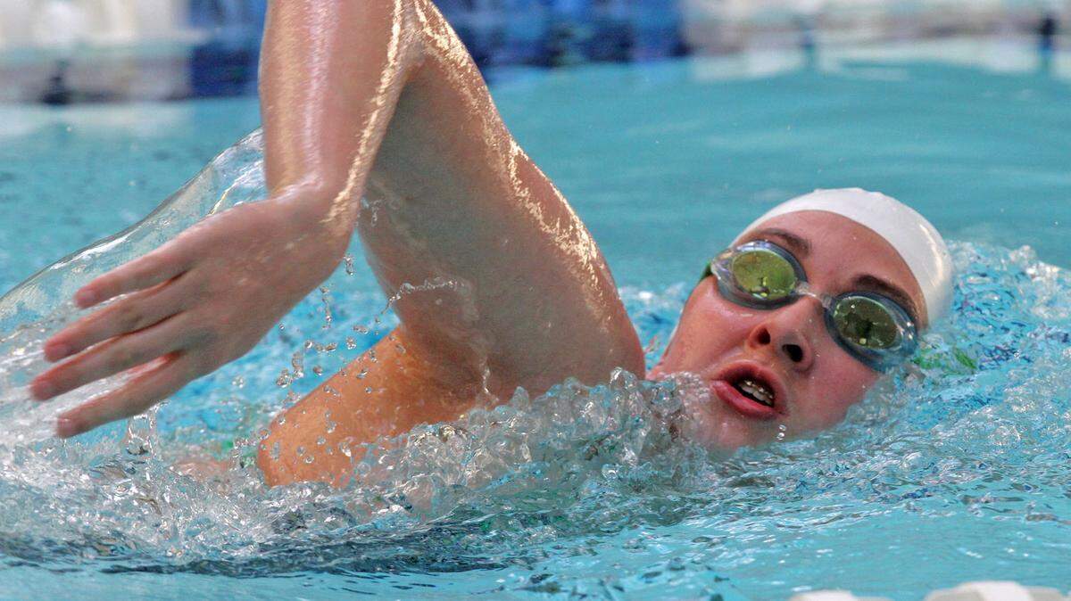 JOHN FITZHUGH/SUN HERALD 
 Harrison Central and Biloxi Elite swim team swimmer Kyjana Webber warms up during practice at the Biloxi Natatorium on Wednesday April 6, 2016.