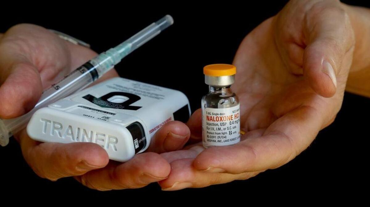 A vial of naloxone and an injector kit of the drug that is used as an antidote to prescription painkiller overdoses.