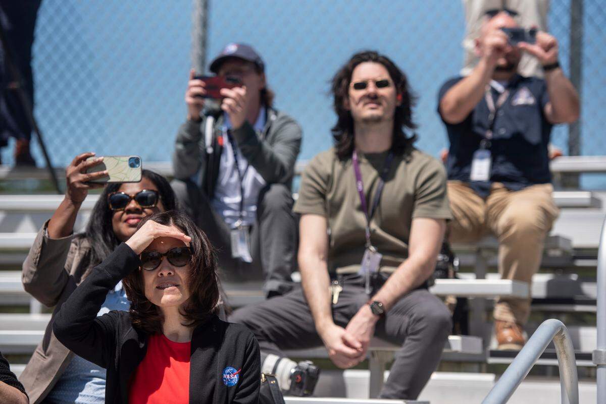 NASA guests and employees watch as NASA tests an RS-25 engine at NASA’s Stennis Space Center in Bay St. Louis on Wednesday, April 3, 2024. The engines, which are destined for NASA’s Artemis missions back to the moon, are assembled and tested at Stennis.