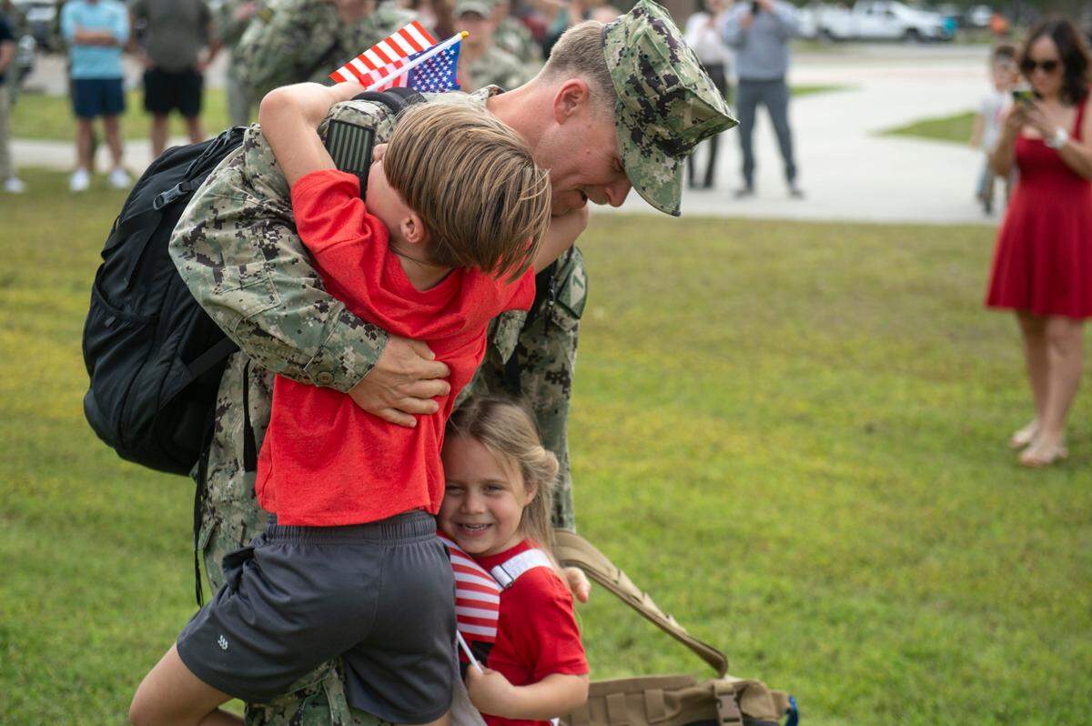 Families are reunited with members of Naval Mobile Construction Battalion 1 as they return home from deployment on Thursday, March 13, 2025, to Naval Construction Battalion Center Gulfport.