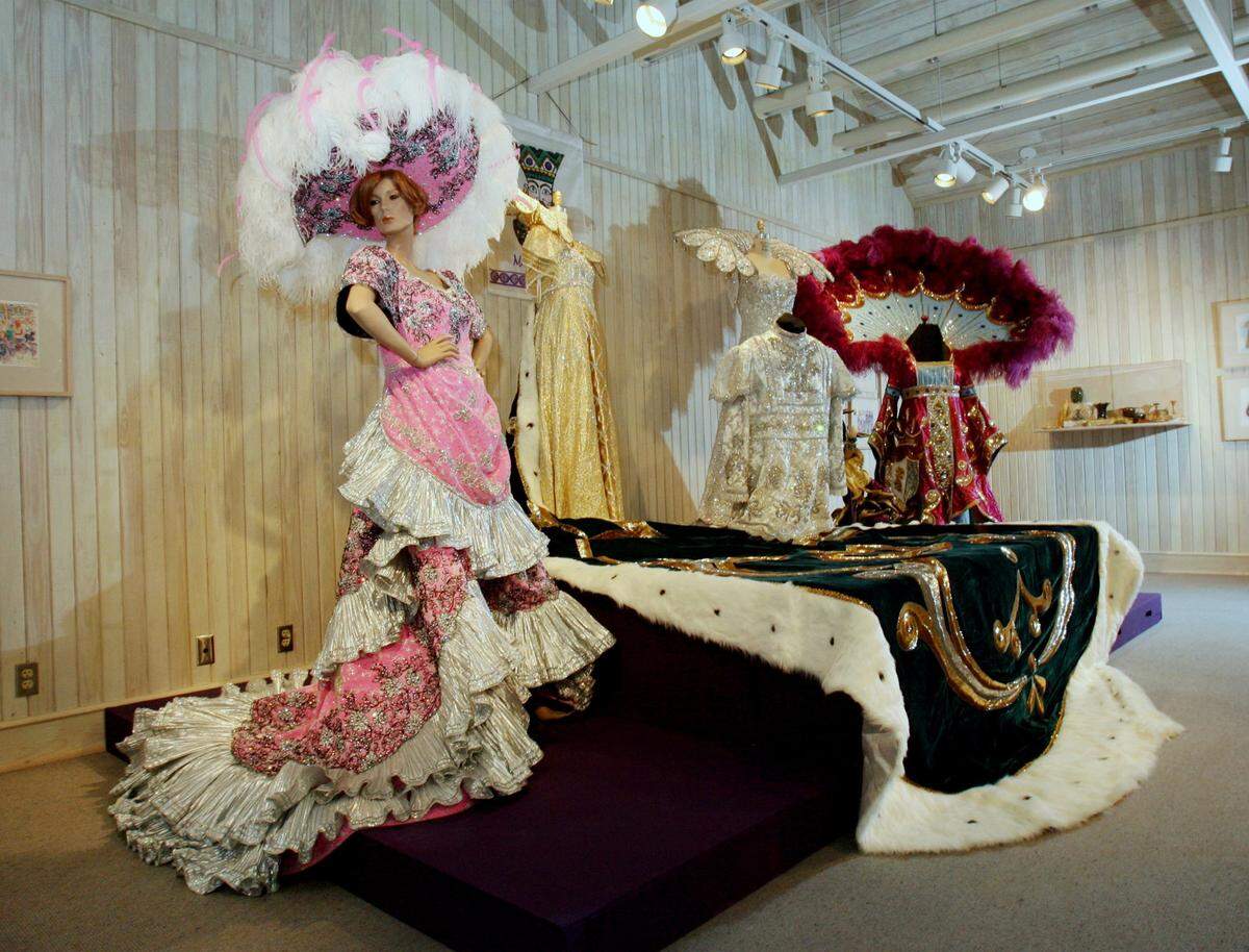 Mardi Gras gowns with sweeping trains are on display at Walter Anderson Museum of Art in Ocean Springs in this 2006 Sun Herald file photo.
