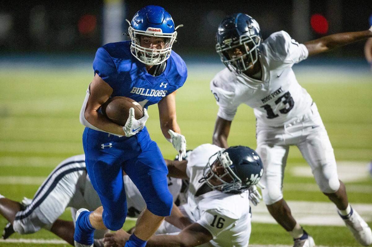 Vancleave’s John Peterson (1) breaks past the defense during a game against Moss Point at Vancleave Football Stadium in Vancleave on Friday, Sept. 9, 2022.