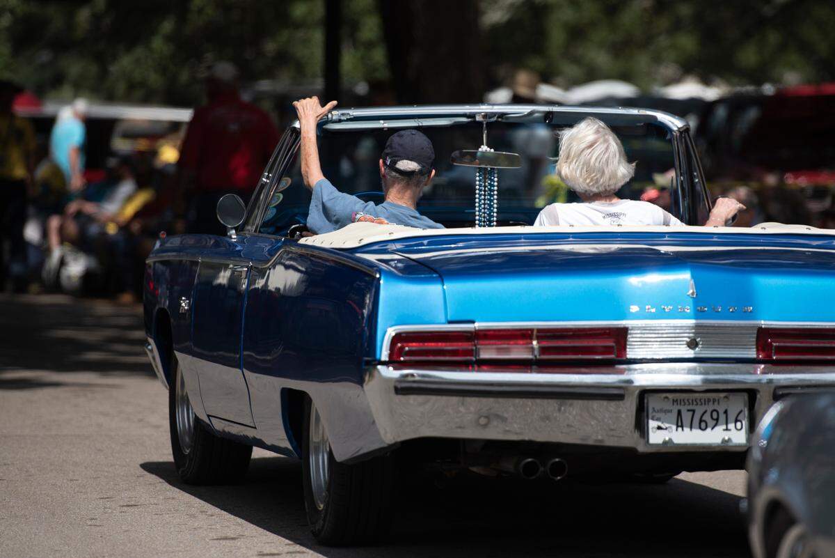 Cruisers arrive at Cruise Central at Centennial Plaza during Cruisin’ the Coast in 2023. This year spectators will take free shuttles to Cruise Central.