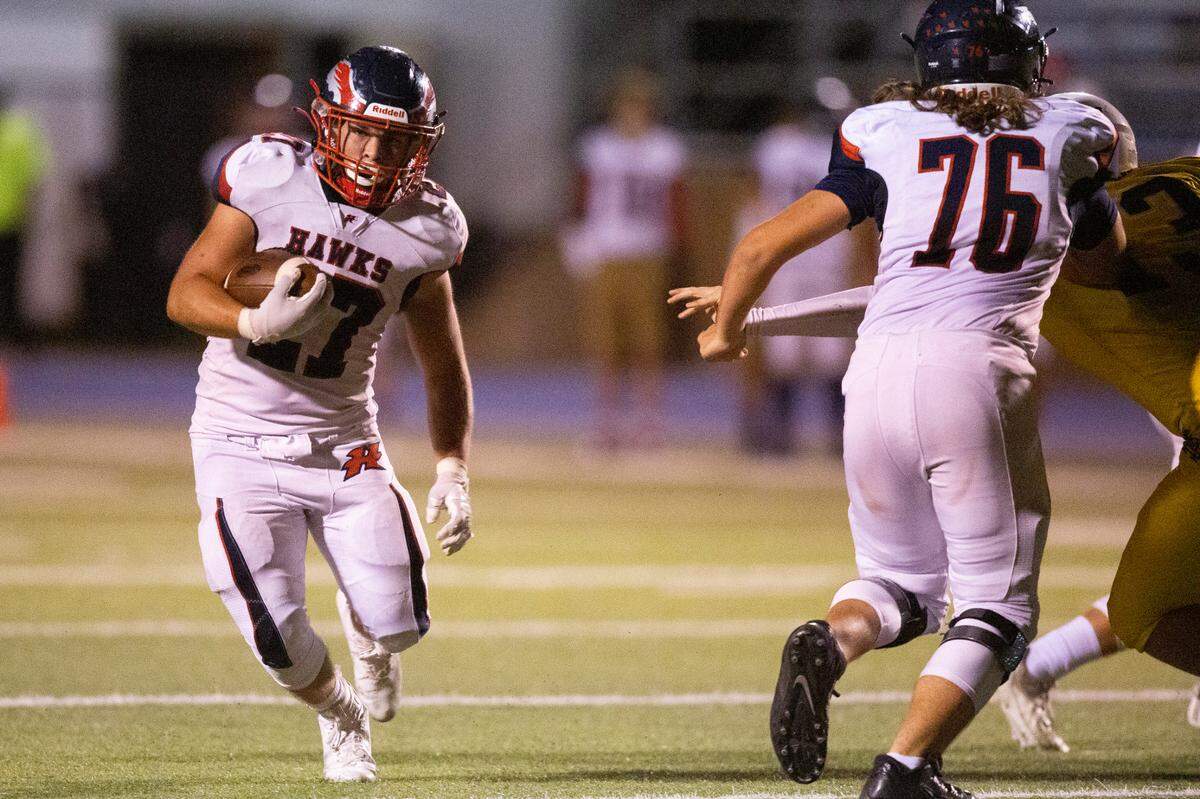 Hancock’s Jeffery Hopgood runs the ball down the field during a game against St. Martin at Joe Barlow Stadium in St. Martin on Friday, Sept. 30, 2022.