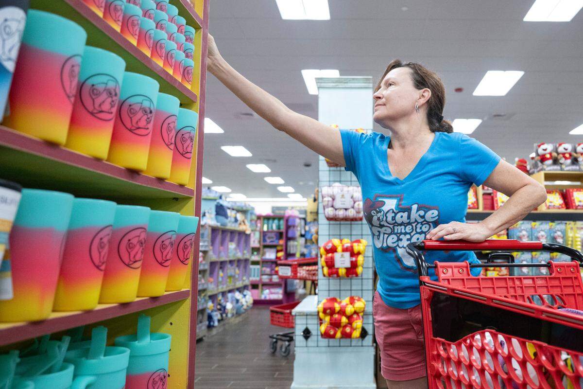 Customers shop for Buc-ee’s merchandise as the popular travel stop opened its first Mississippi location in Harrison County on Monday, June 9, 2025.