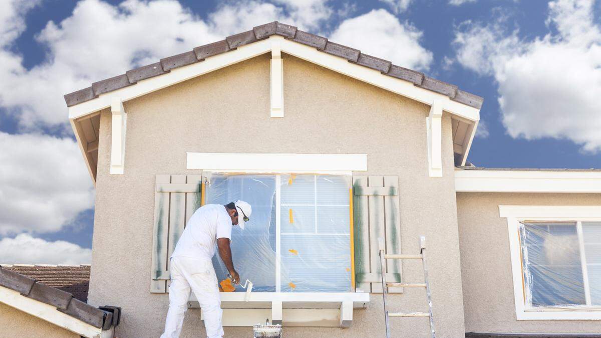 FOTOLIA/TNSWhen painting the exterior of your house, use top-of-the-line exterior, 100 percent acrylic latex house paint in flat, satin, semigloss or gloss finish.