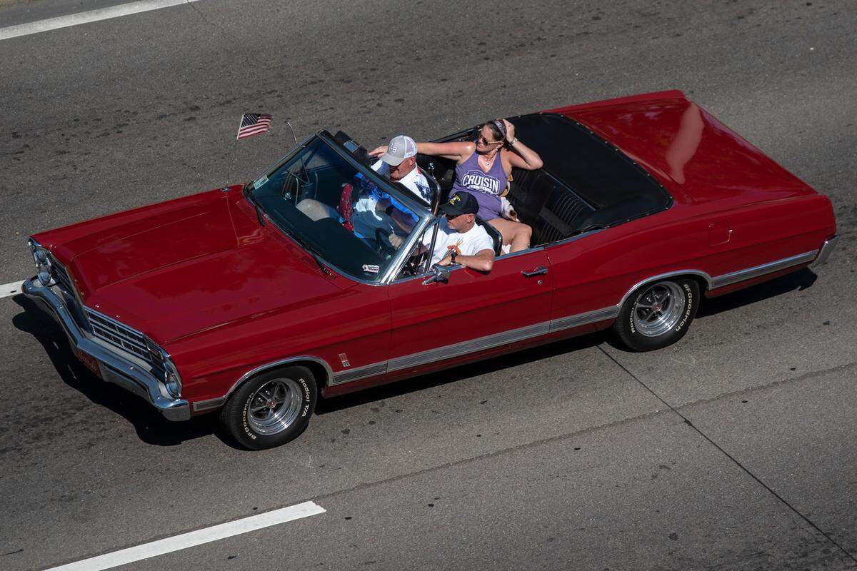 Cruisers drive down Highway 90 in Downtown Biloxi during Cruisin’ the Coast 2022. The event, the largest in Mississippi, won a state and national award in April.