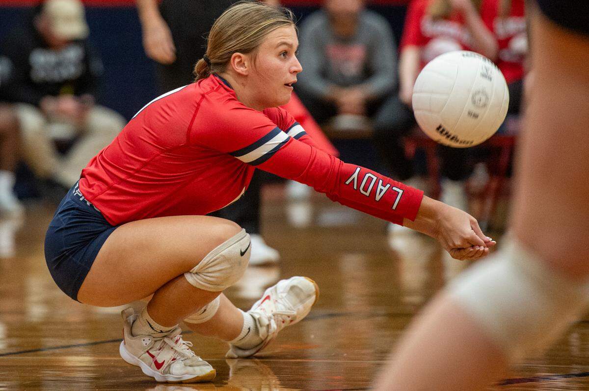 Hancock’s Josey Smith sets the ball during the 6A South State Championship game at Hancock High School in Kiln on Monday, Oct. 16, 2023.