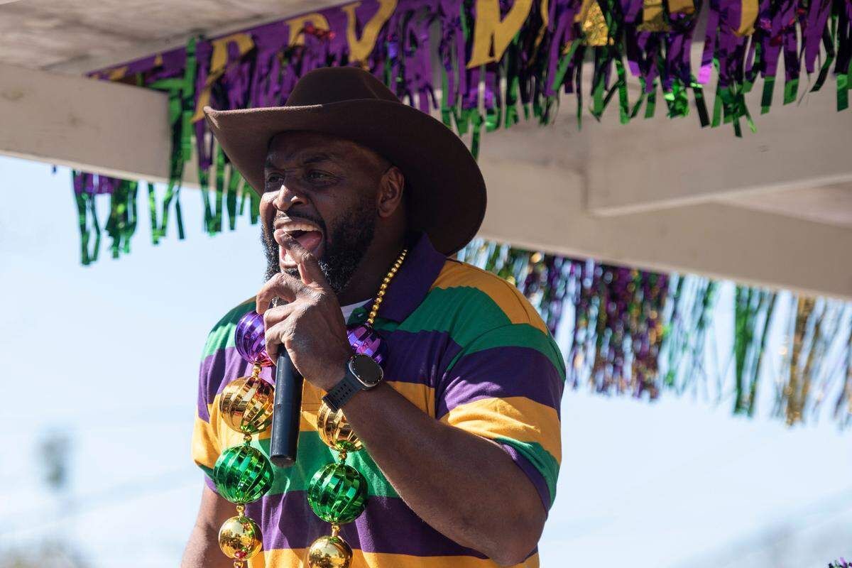 A float rider sings during the Jackson County Carnival Association Mardi Gras parade in Pascagoula on Saturday, March 1, 2025.