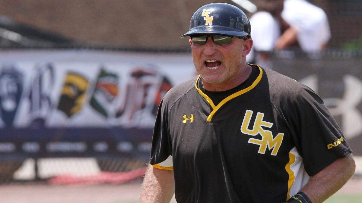 JOHN FITZHUGH/SUN HERALD 
 Southern Miss coach Scott Berry encourages his team between innings of their C-USA championship game against Rice on Sunday May 29, 2016 at Pete Taylor Park in Hattiesburg.