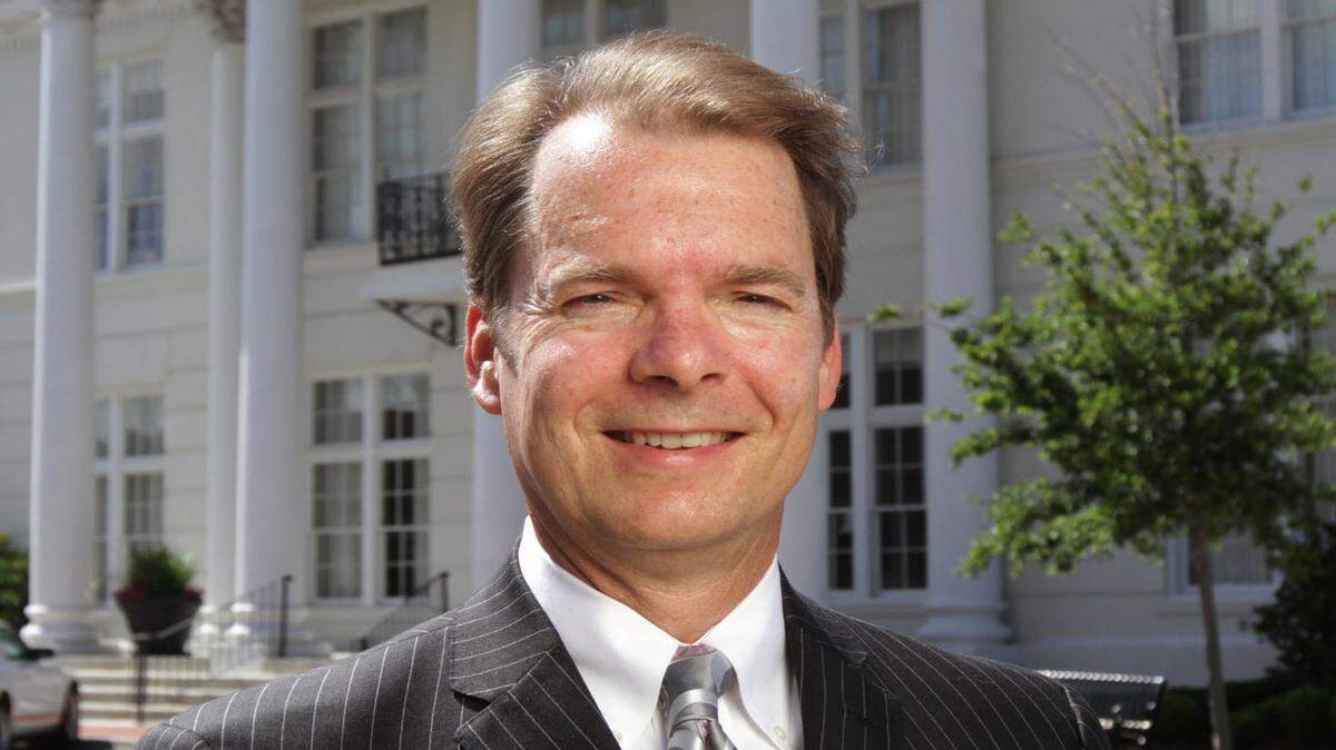 JOHN FITZHUGH/SUN HERALD 
 Billy Hewes poses in front of Gulfport City Hall on Wednesday June 5, 2013. Hewes will be sworn in as the city's mayor on Friday.