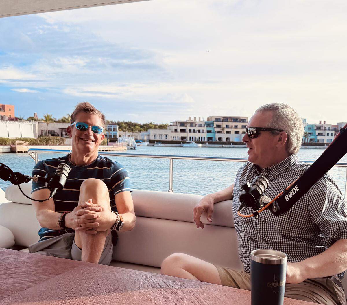 Ron Ladner, left, and Rimmer Covington record their first business podcast in the Caribbean. The podcast will provide business wisdom based on their years of operating Shaggy’s restaurants and Ladner’s new book, “Shaggy’s Cheeseburgers.”