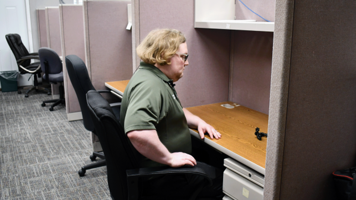 Martin Moore, coordinator with Pine Belt Mental Healthcare Resources, works from the crisis team’s call center in Hattiesburg. Pine Belt’s mobile response team is one of 14 across the state that deploys in real time to help individuals in mental health crises.