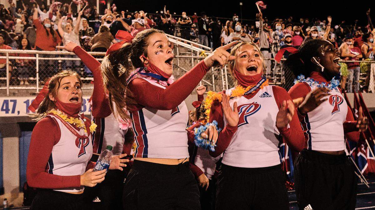 The Pascagoula Cheer Team and the crowd reacts the Panthers’ game-tying field goal at the end of regulation on Friday, Nov. 20, 2020.