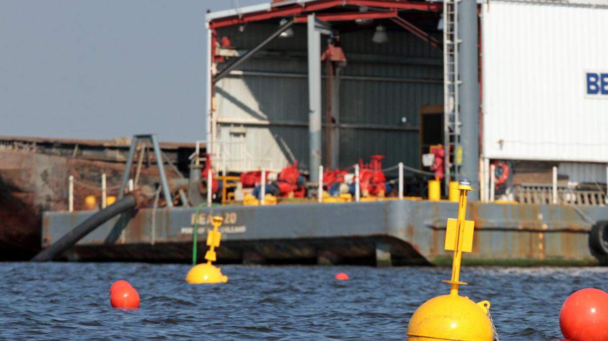 JOHN FITZHUGH/SUN HERALD 
 Additional bouys were added to mark the underwater dredge pipe near the east end of Deer Island after Mark Barhanovich's fatal accident on Sunday Sept. 16, 2012.