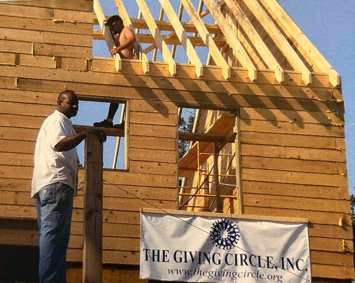 Former South Mississippi producer and journalist All Showers works on his house after Hurricane Katrina. Showers, a broadcast journalist who for years lived and worked in Hancock County, recently passed away.